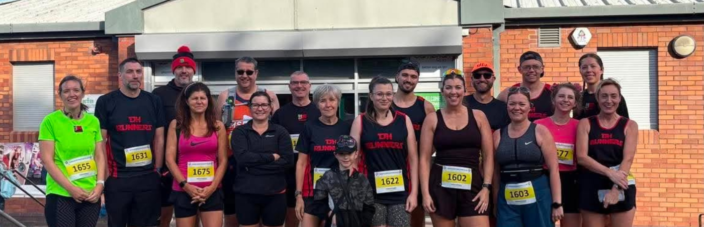 DH Runners team photo Sport In Action 10k